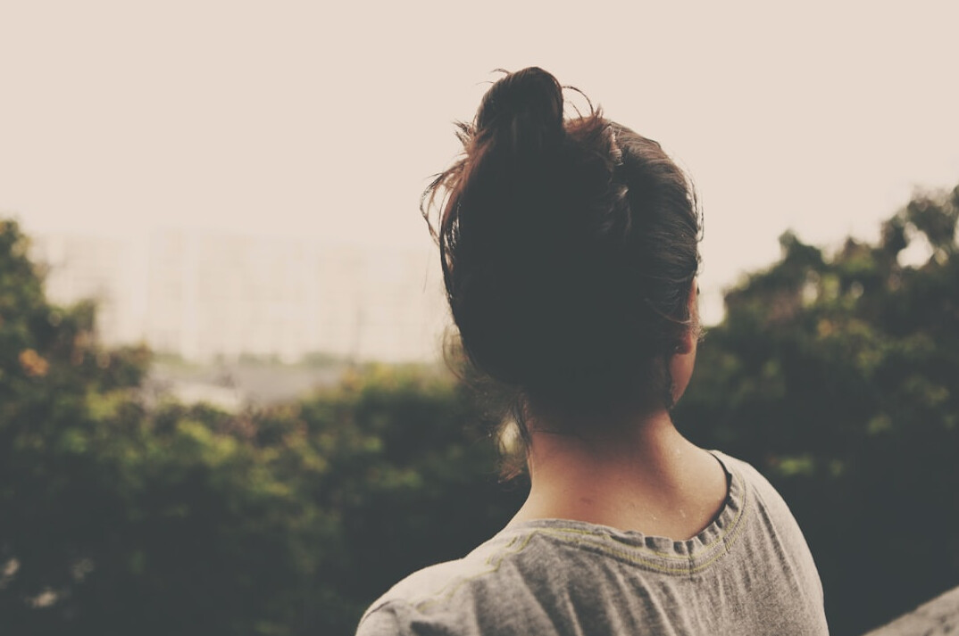 woman reflecting alone