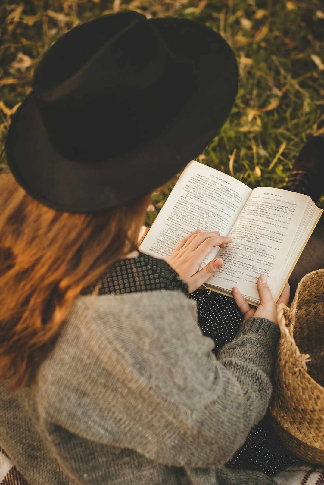 woman reading self help book