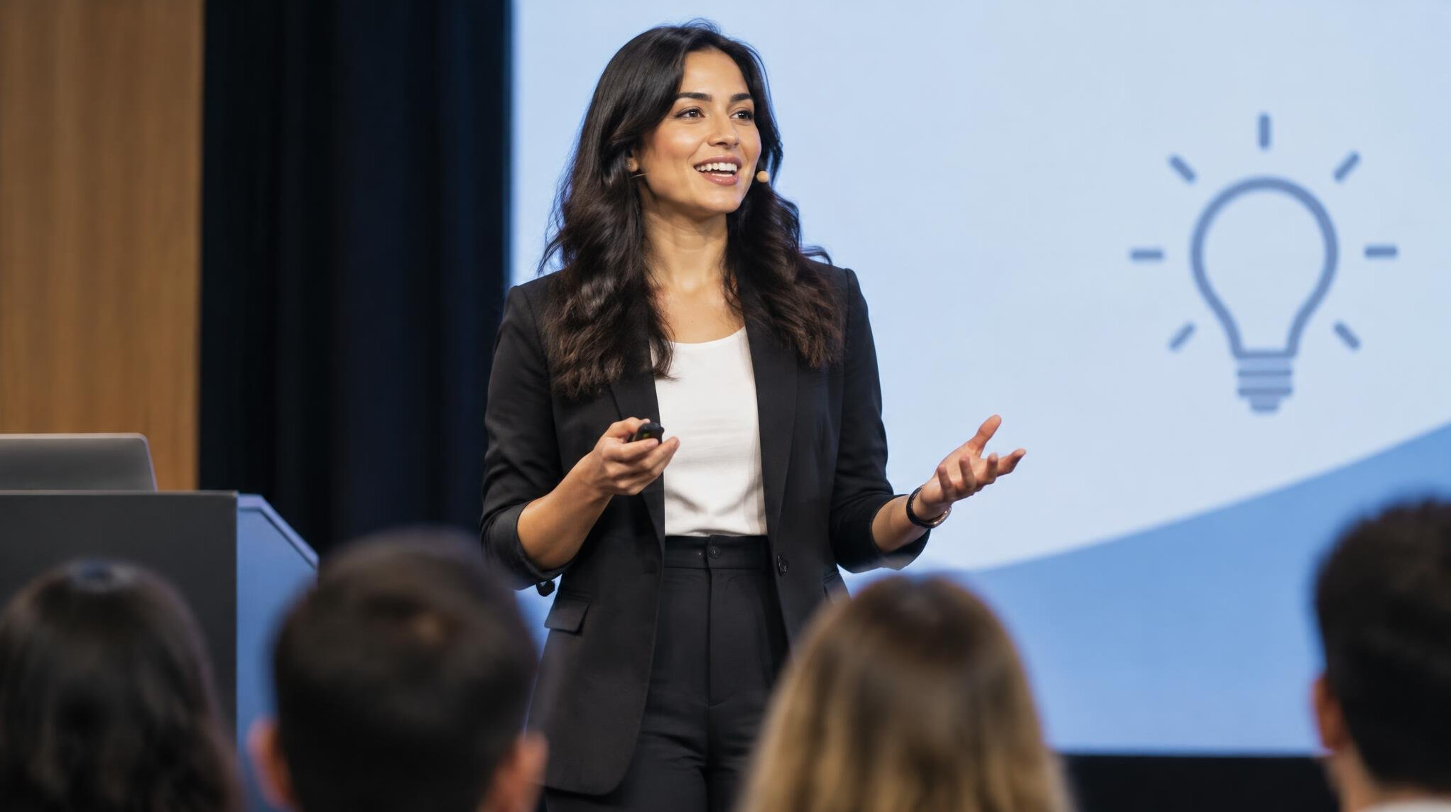 confident woman speaking to audience